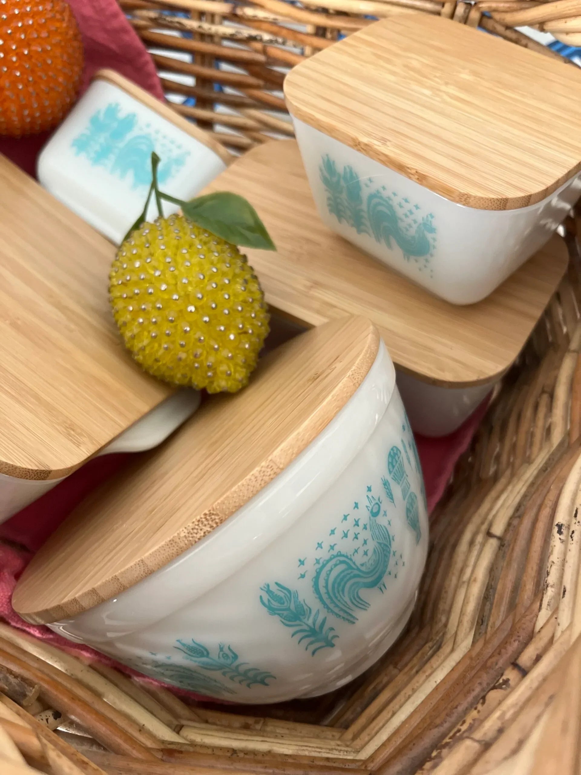 airtight pyrex bamboo lids in a basket